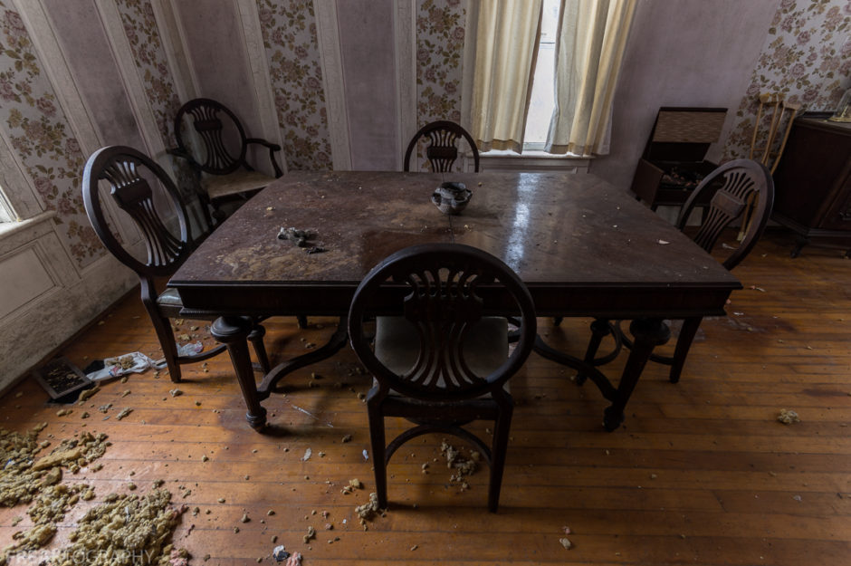 Freaktography, abandoned, abandoned photography, abandoned places, antique furniture, antique table, creepy, decay, derelict, dining room table, furnitue, haunted, haunted places, photography, table, urban exploration, urban exploration photography, urban explorer, urban exploring