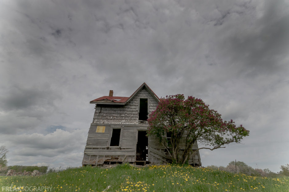 Freaktography, abandoned, abandoned house, abandoned photography, abandoned places, clouds, creepy, dandilions, dark clouds, decay, derelict, grass, haunted, haunted places, omnious sky, photography, sky, urban exploration, urban exploration photography, urban explorer, urban exploring