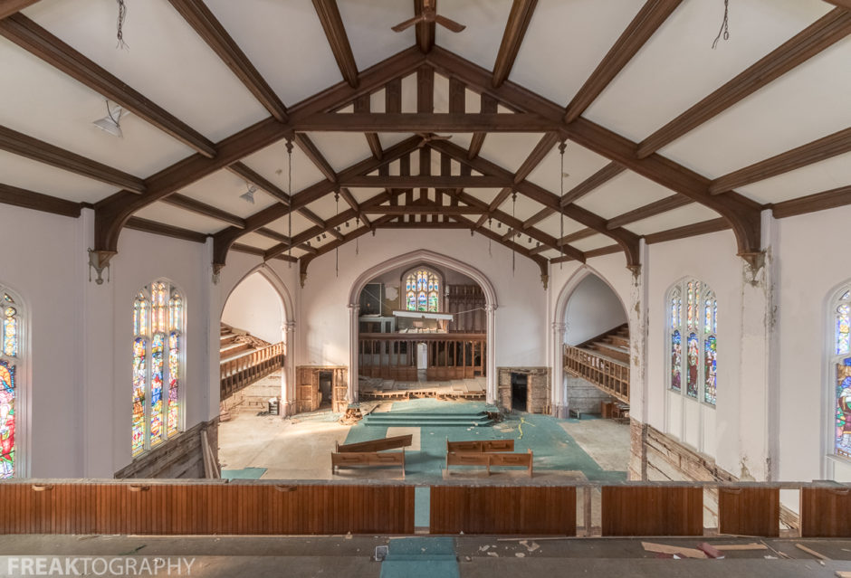 Wide angle urban exploration photograph of an abandoned church