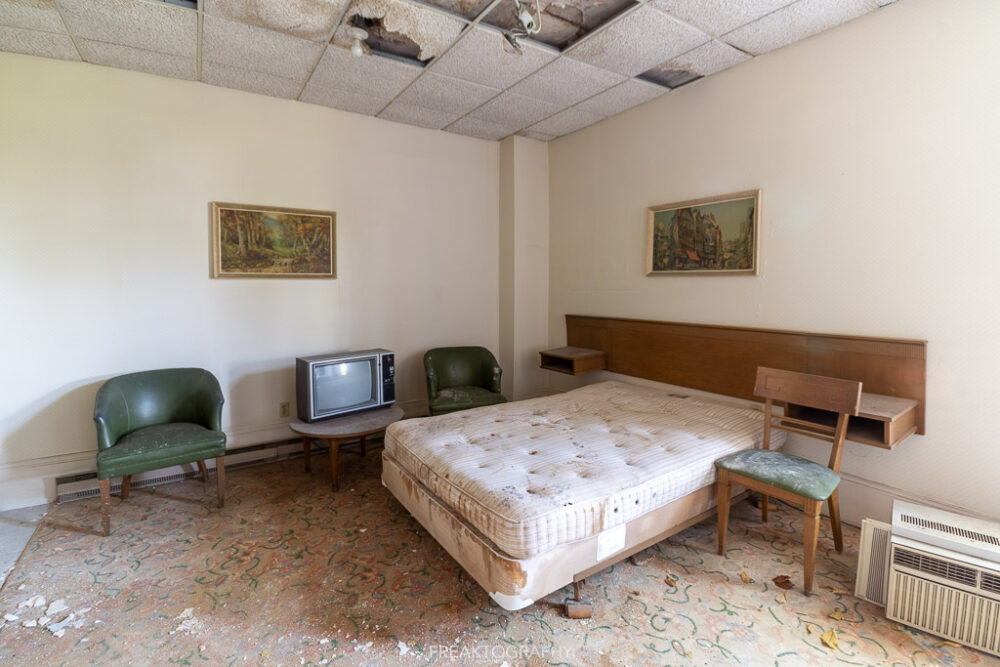 abandoned 1980s hotel bed