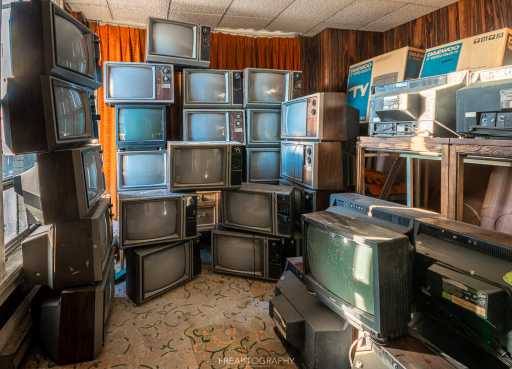 abandoned 1980s hotel stacked televisions
