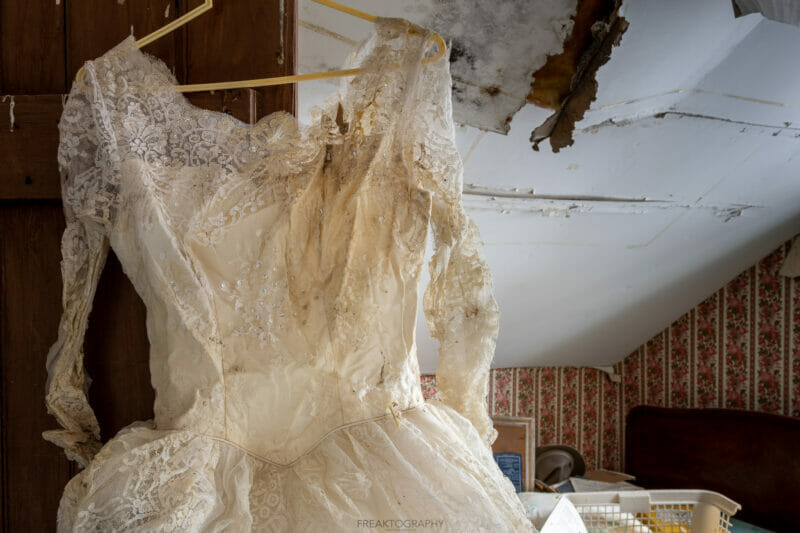 abandoned house old trucks wedding dress