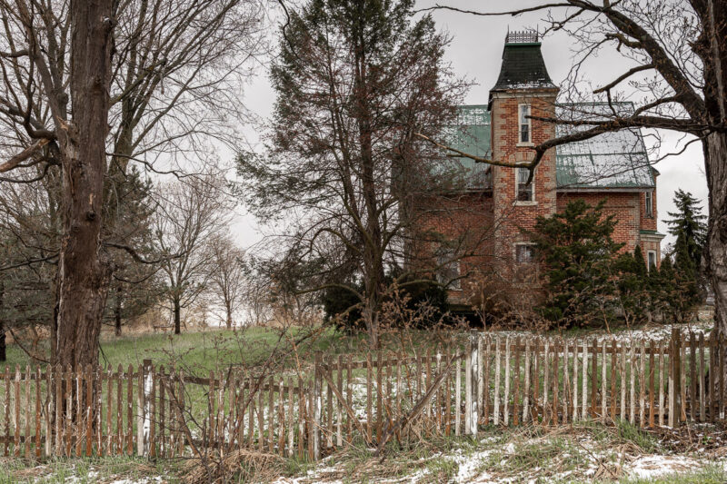 abandoned addams family farm house