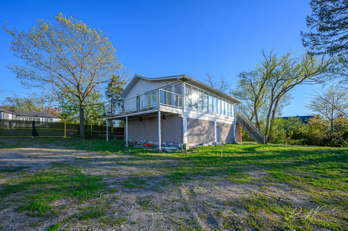 Abandoned Waterfront Home With Artwork Left Behind