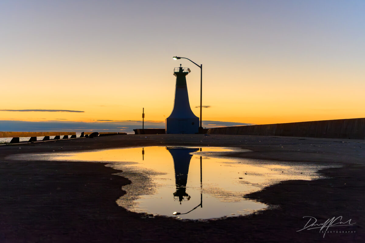 Tranquil Morning Light at the Lighthouse Pier