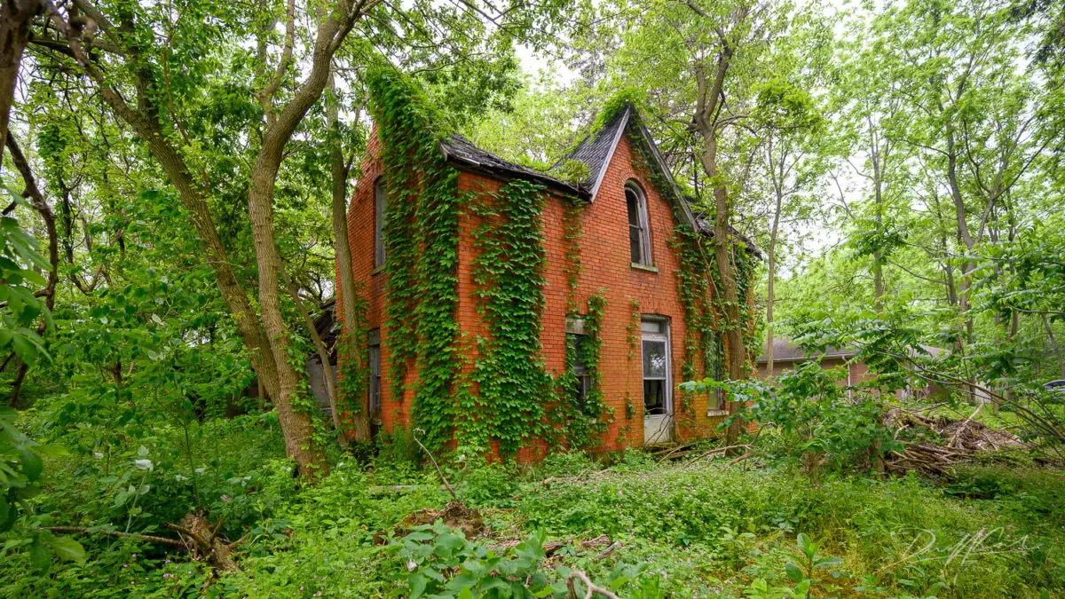 Photograph of an abandoned house located in Ontario, Canada, captured during an urban exploration project by Freaktography. This image is part of a visual study on the rise of abandoned and vacant properties across rural and urban Ontario, including luxury neighborhoods like Bridle Path. Shot on location with natural lighting to showcase the haunting beauty of decay.
