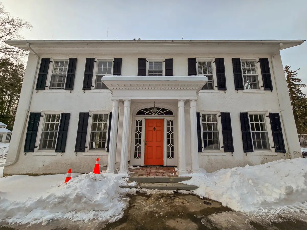 Photo of the demolished Oakville heritage home at 1475 Lakeshore Road East, originally built in 1830 and once known as the “Halfway House.” Despite protection under the Ontario Heritage Act, this two-storey colonial-style building was torn down in 2025, leaving behind rubble and a felled tree. Documenting abandoned places, abandoned buildings, and lost history in Ontario, Canada.