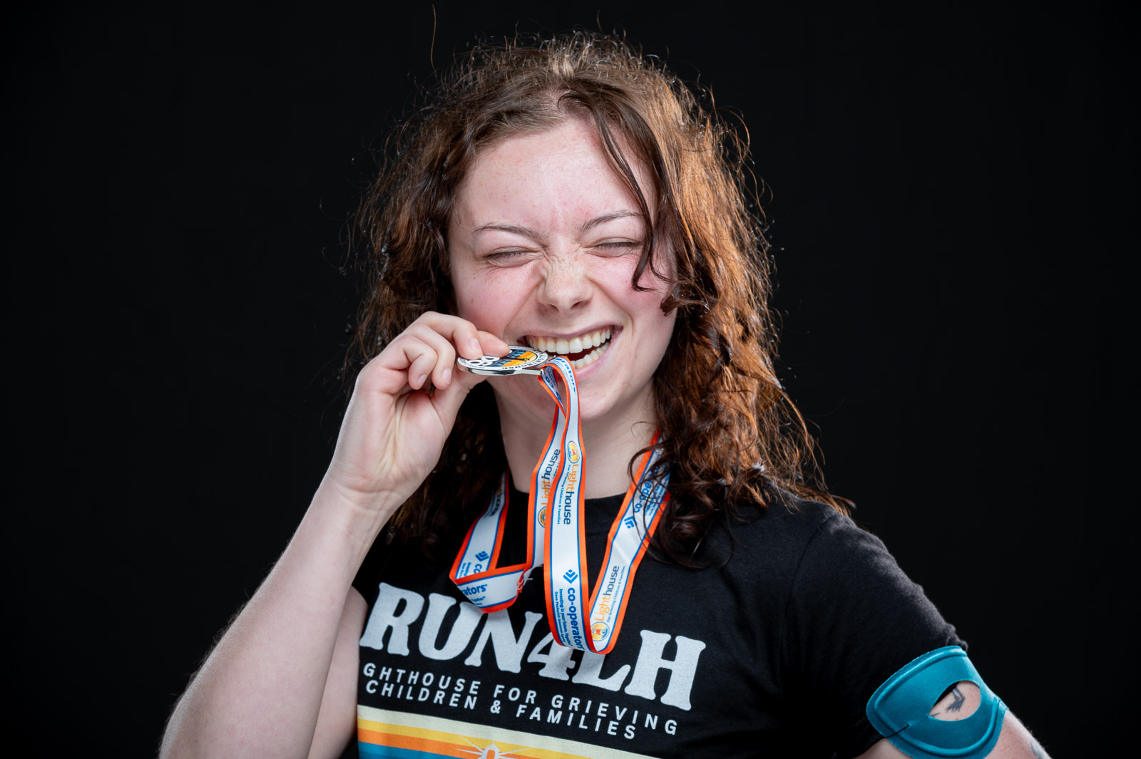 RUN4LIGHTHOUSE Finisher Portrait | Burlington Portrait Photography